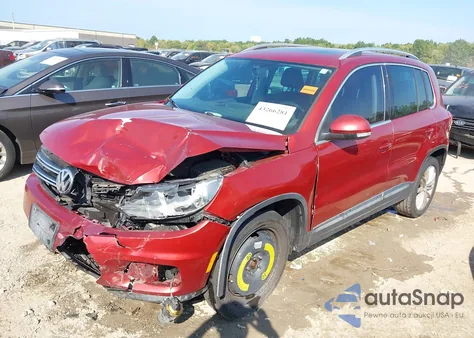 2014 Volkswagen Tiguan Sel из США, поврежденный, VIN WVGAV3AX5EW110934